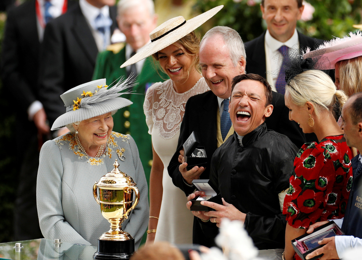 Frankie Dettori celebrating winning the Gold Cup at Ascot with the late Queen Elizabeth II.