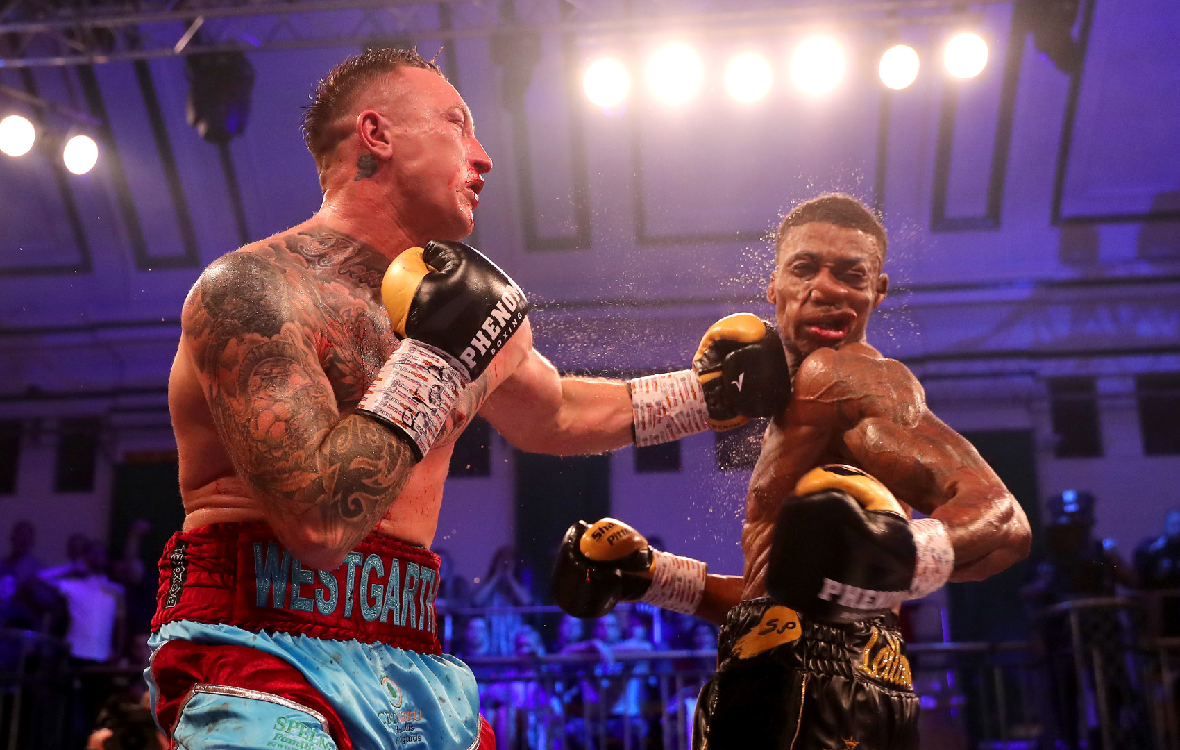 Dec Spelman punches Shakan Pitters.