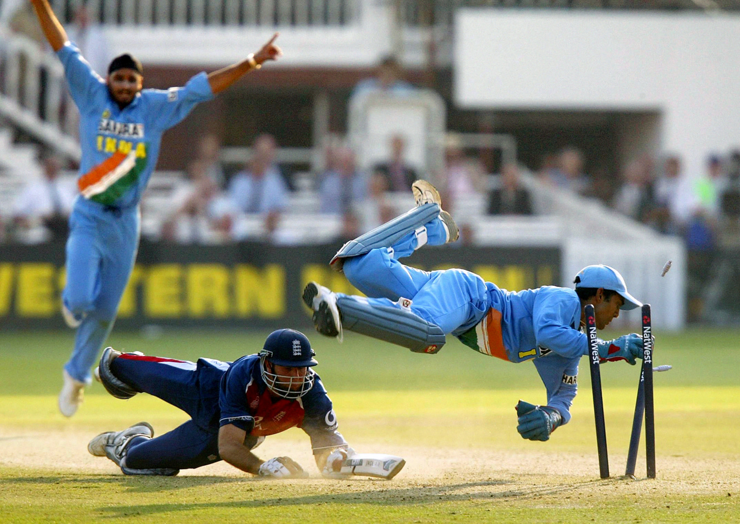 England Cricketer being stumped out by opposing player at Lords.