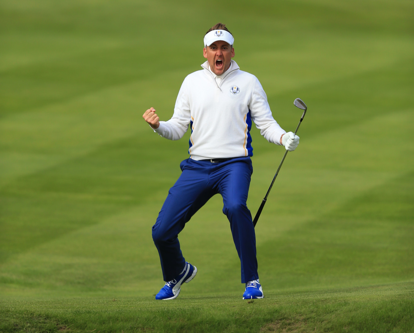 Golfer screams for joy on the golf course.