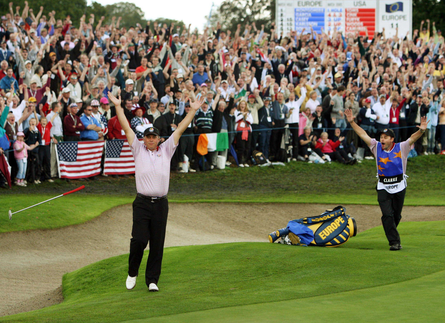Big reaction from the crowd and golfer after putting a winning ball at the Ryder Cup.