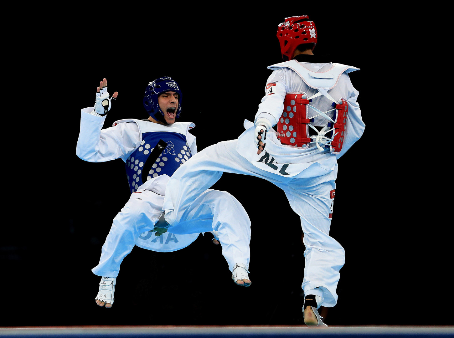 A low blow to one of the Taekwondo competitors during a match at the London 2012 Olympics.