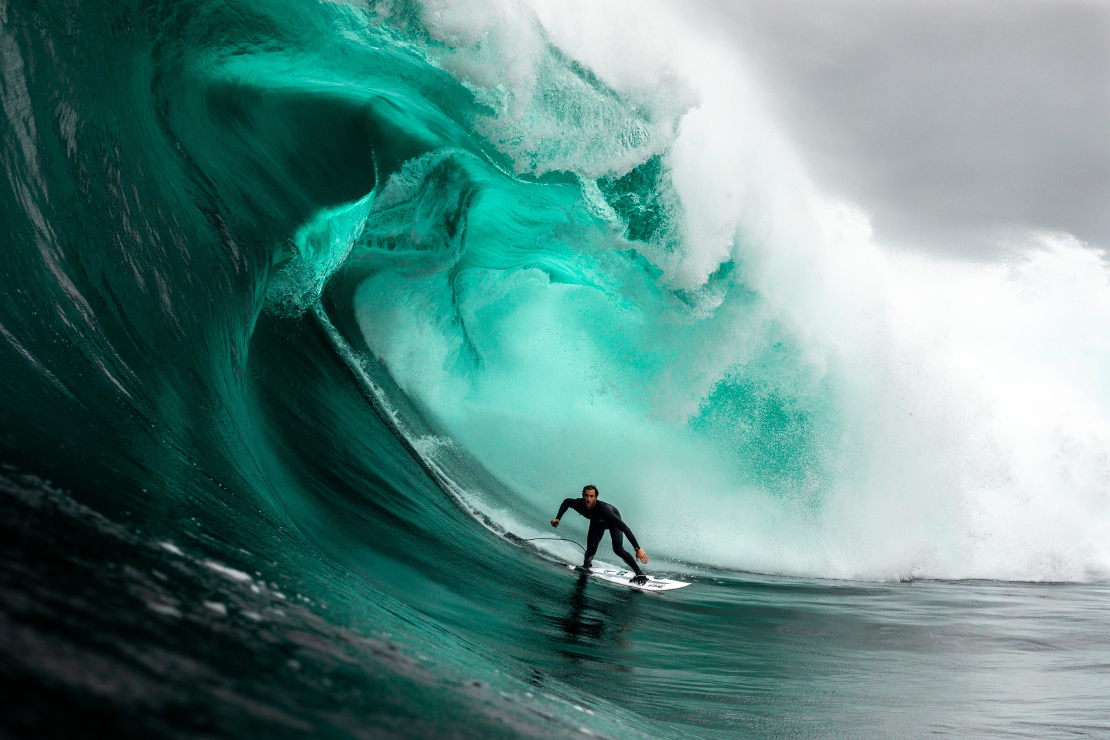 Mikey Brennan surfing a huge wave at Ship Stern's Bluff.