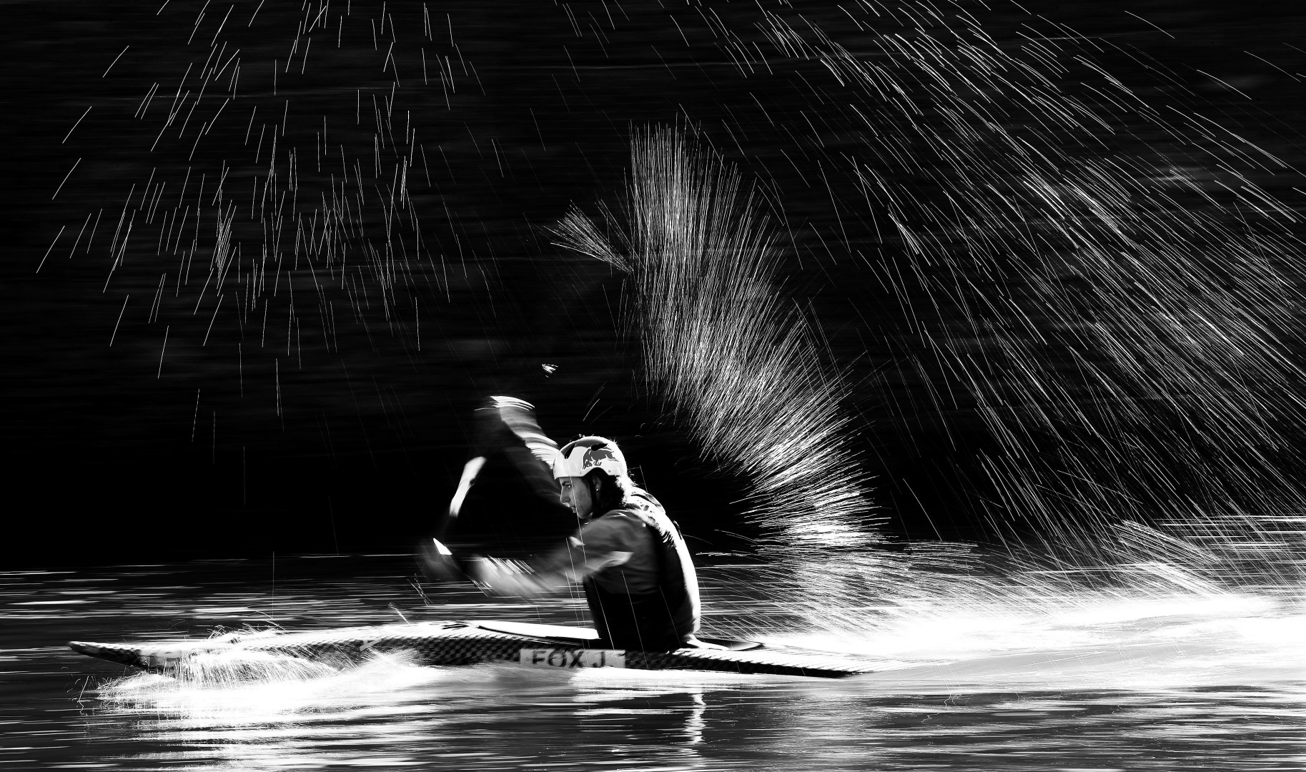 Black & White image of Jess Fox in action during slalom canoe race.