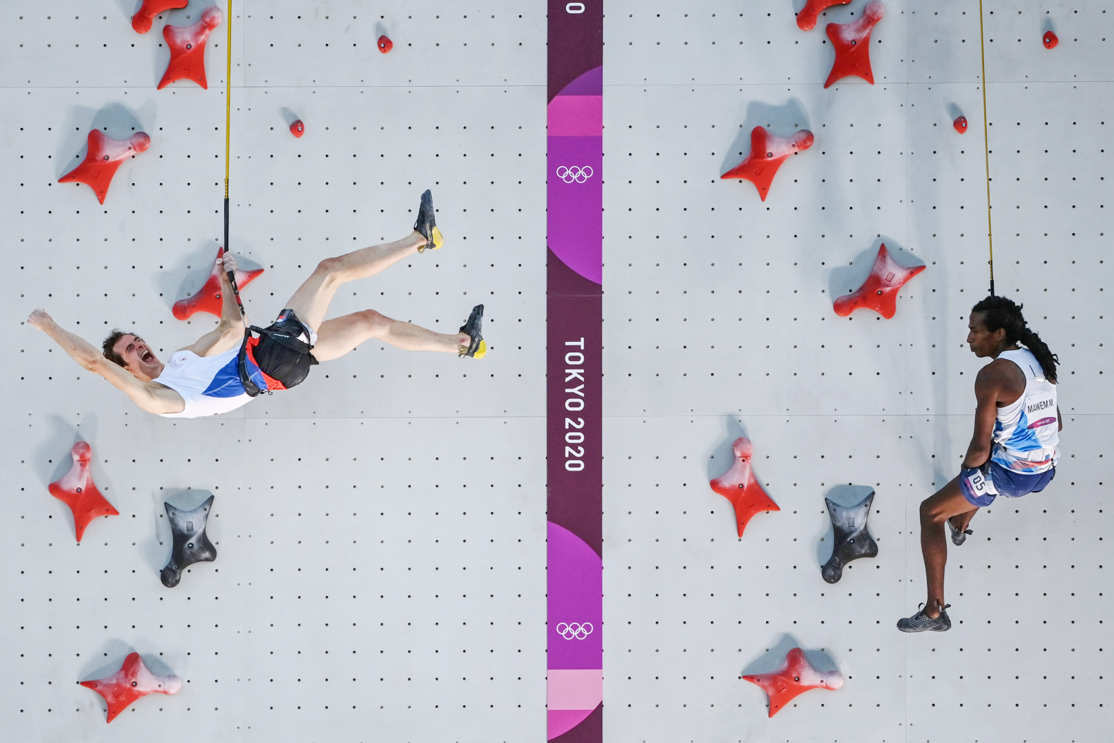 Adam Ondra celebrating as he beats Mickael Mawem in Lead climbing competition at the 2020 Toyko Olympic Games.