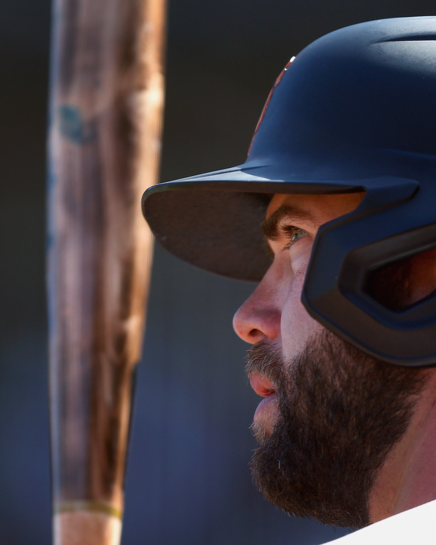 Close up of batter eyeing up the pitcher's throw.