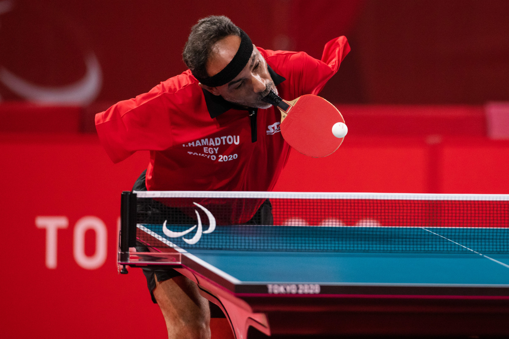 Ibrahim Hamadtou hitting a shot during a Para Table Tennis match at the Paralympic games, Tokyo 2020.